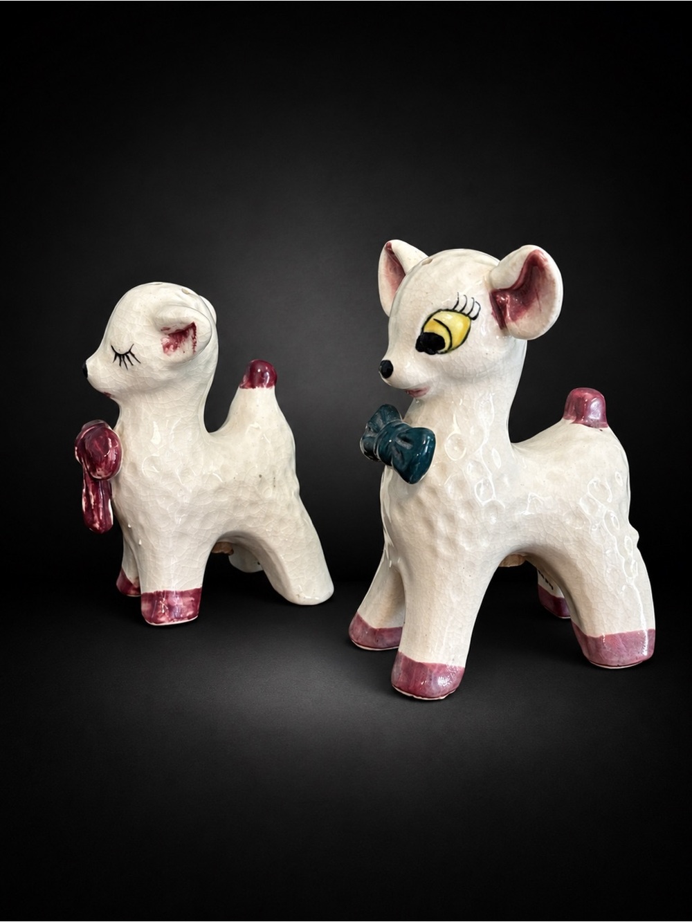 White Ceramic Deer Figurines with Pink Accents and Teal Bow